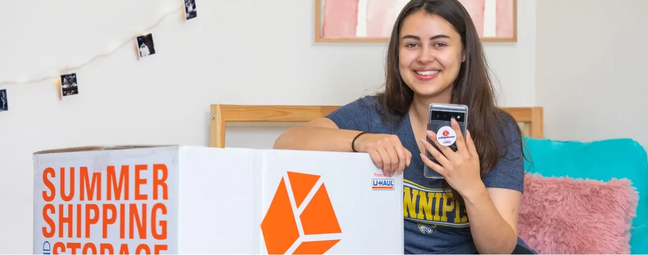 Student using university-partnered storage services for dorm move-in.